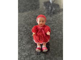 Poupée Petit Colin habillee d'une robe dentelle en tricot