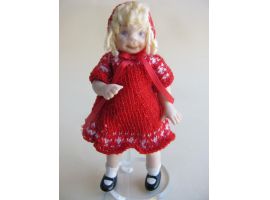 Girl in knitted red outfit