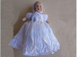 Baby in christening gown