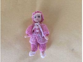 Porcelain Dolls doll with knitted outfit