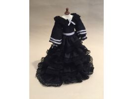 Black frou frou dress on mannequin