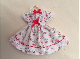 Litte girl dress on hanger