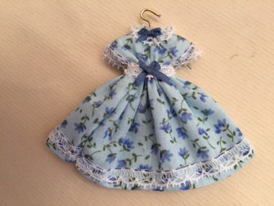 Litte girl dress on hanger