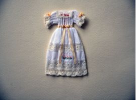 Hand sewn and embroidered dress on  battiste