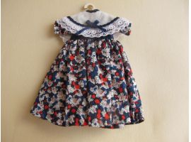 Doll's dress on hanger