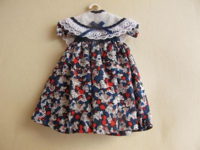 Doll's dress on hanger