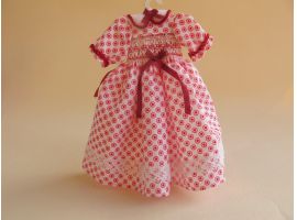 Doll's dress on hanger