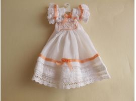 Doll's dress on hanger