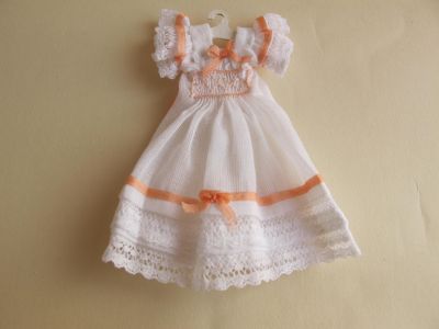 Doll's dress on hanger